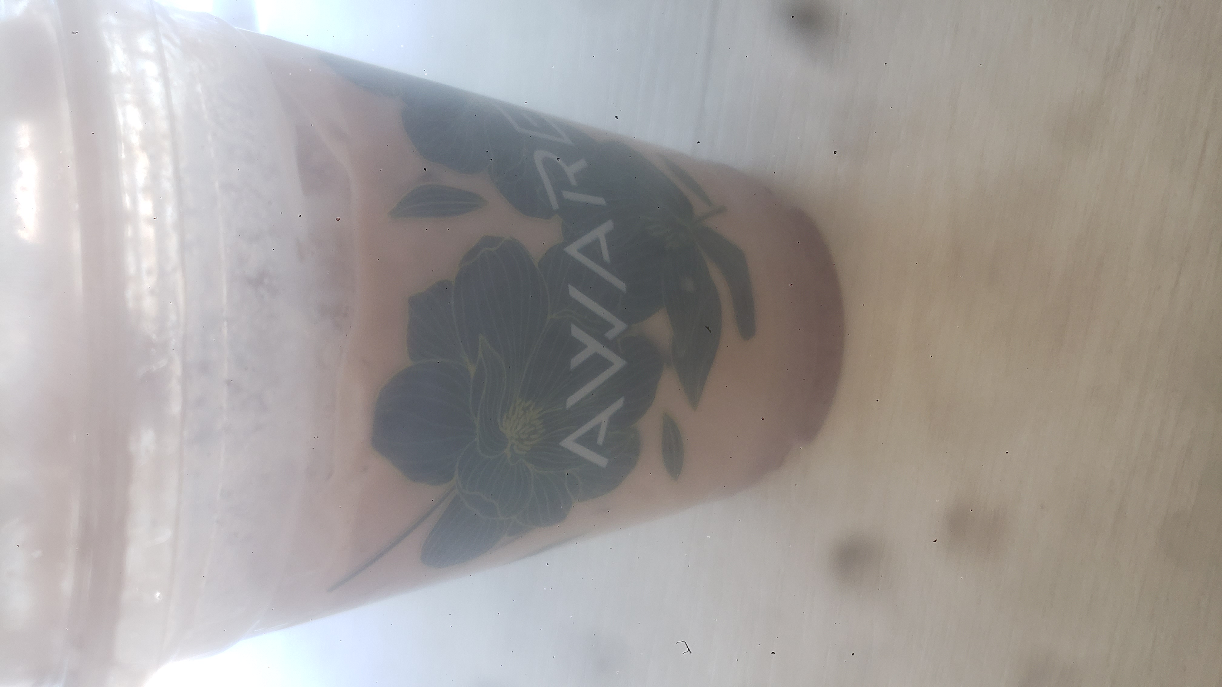 Plastic cup of matcha einspanner.